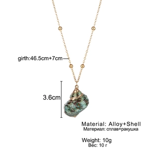Bohemian gold plated seashell pendant necklace with a natural turquoise-toned shell charm