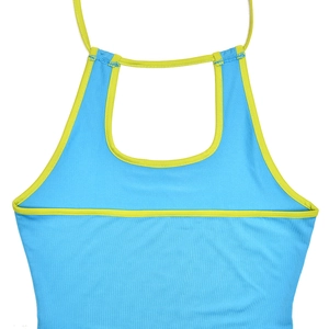 Detail of blue ribbed knit halter top featuring vibrant green contrasting trim and straps