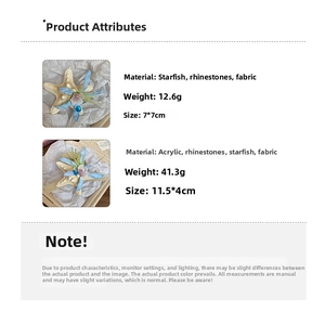 Detailed view of starfish hair clips with rhinestones and fabric flowers for beach style