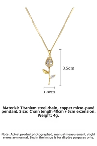 Detailed view of tulip pendant necklace with clear zircon stones on gold chain
