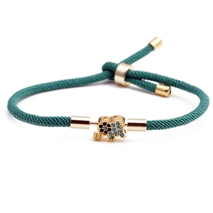 Adjustable green cord bracelet featuring a gold elephant charm with inlaid zircon stones