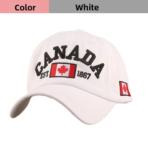 Detailed view of black CANADA embroidery and maple leaf on white cotton baseball cap