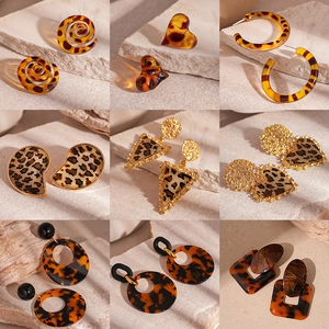 Leopard print resin earrings collection with vintage amber and geometric heart shapes