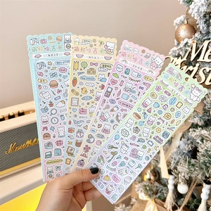 Detailed view of four colorful cartoon bear stickers for DIY journaling and scrapbooking