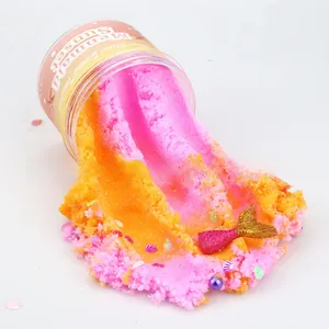 Detail of Mermaid Sunset Slime with pink and orange gradient texture and seashells
