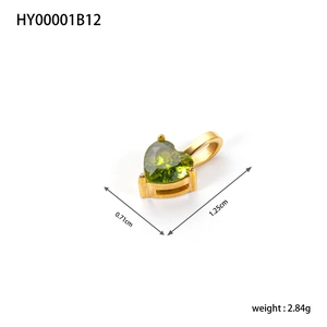 Green heart zircon pendant in gold setting with size 0.71cm x 1.25cm and weight 2.84g