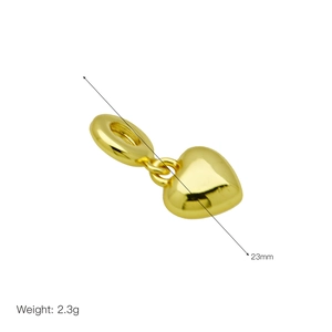 Polished gold heart charm pendant 23mm size and 2.3g weight detail on white background