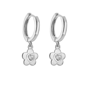 Detailed view of silver hoop earrings with flower drop and heart-cut zircon stone