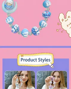 Close-up of cute hand-painted beads and moon pendant accessory for phone or bag charm