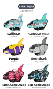 Dog life jacket color display featuring shark fin design and adjustable buckles