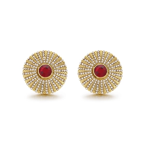 Vintage gold sunflower stud earrings with red center stone and crystals on white background
