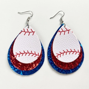 Detailed macro view of triple-layered baseball drop earrings in red, white and blue glitter