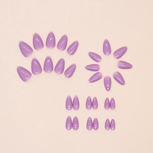 Glossy light purple almond shaped press-on nails set displayed on a pink background