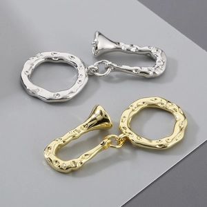 Detailed view of textured 18K gold and silver plated OT toggle clasps for jewelry