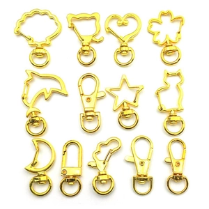 Goldfarbene Karabinerhaken aus Legierung in Stern- und Herzform für DIY-Schmuck