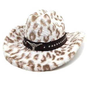 Leopard print western cowboy hat with studded leather band and silver bull skull buckle