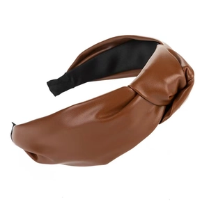 Detailed view of dark brown PU leather headband featuring a stylish twisted knot design