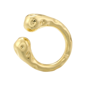 Macro detail of 18K gold-plated ring showing irregular lava texture and metallic luster