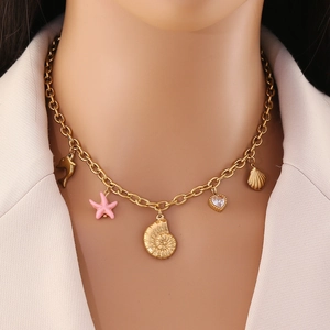 Gold stainless steel necklace featuring pink starfish, shell, and zircon heart charms