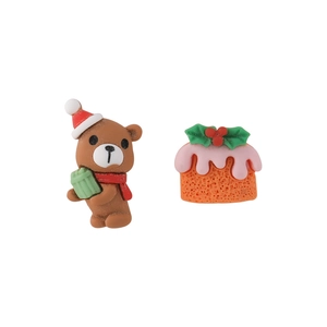 Close-up of cute Christmas resin bear and pudding figurines for holiday DIY decor