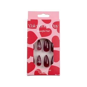 Valentine French red almond press-on nails with white bow designs and heart pattern box