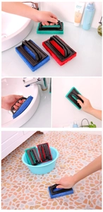 Close-up of ergonomic sponge brush cleaning bathroom tiles and kitchen sinks