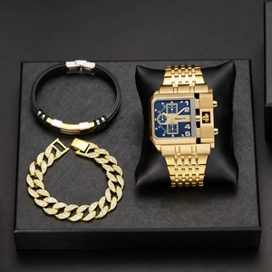 Detail view of Oulm quartz watch set with golden Cuban chain bracelet and bangle
