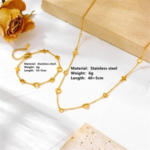Golden stainless steel four-leaf clover necklace and bracelet set with stone and dry rose