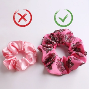 Detail comparing pink satin scrunchie with large floral rose print hair tie accessory