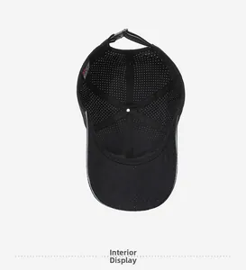 Detail view of the breathable mesh inner structure and adjustable strap of the black cap