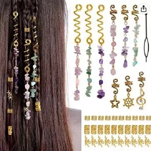 Detail view of gold spiral hair rings with natural crystal pendants for braided hairstyles