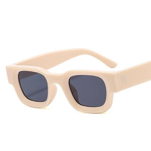 Retro cream square thick frame sunglasses with dark lenses in a 45-degree angle view