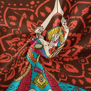 Close-up of bohemian tapestry fabric showing fine woven texture and ethnic mandala pattern