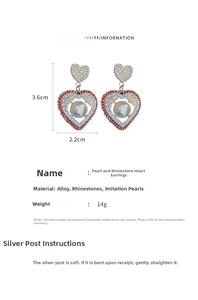 Détails des boucles d'oreilles cœur avec perles et strass, dimensions 3,6x2,2cm