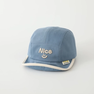 Detailed close-up of blue baby baseball cap with Nice embroidery and soft brim