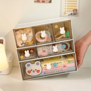 Minimalist white desktop organizer with six clear drawers and cute bunny handles