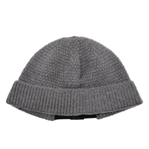 Detailed close-up of gray knit docker hat showing ribbed texture and adjustable strap
