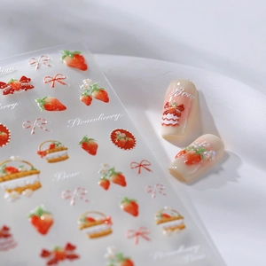 Glittery strawberry and bow nail art stickers with sweet floral and fruit designs