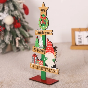Detail of wooden Christmas tree gnome tabletop ornament with festive merry greetings