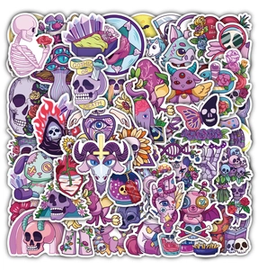 Detailed pile of pastel goth stickers featuring skulls and eyeballs on waterproof PVC