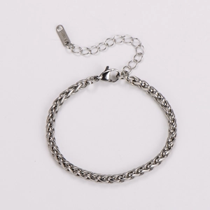 Detailed macro view of silver stainless steel keel chain bracelet with lobster clasp