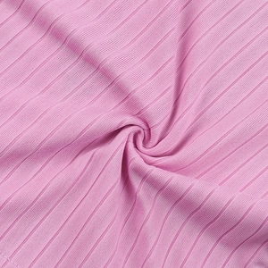 Close-up of pink ribbed knit fabric texture showing elastic stitch details and soft feel