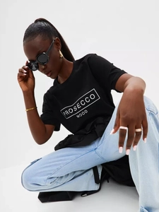 Women's black cotton t-shirt featuring Prosecco Mood print and loose casual fit