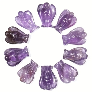 Hand-carved natural amethyst angel figurines arranged in a ring on a clean white background