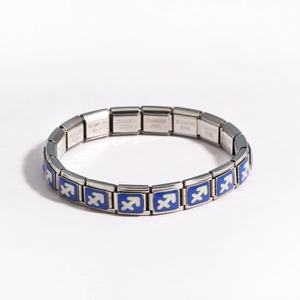 Detail view of Sagittarius zodiac charm on modular stainless steel link bracelet