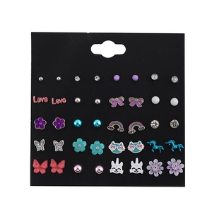 Detail view of 15 pairs assorted stud earrings featuring hearts and unicorns on a card
