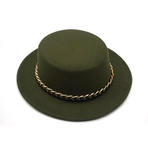 Detailed macro shot of dark green wool felt boater hat with a gold chain decoration