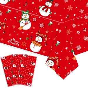 Detail of red Merry Christmas snowflake tablecloth with snowman patterns and 3-piece packaging