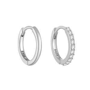 Macro detail of S925 sterling silver hoop earrings with single row pavé zircon stones