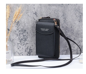 Vertical black lychee leather crossbody phone bag with gold zipper and shoulder strap